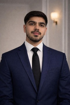 Arnav Hooda wearing a navy suit